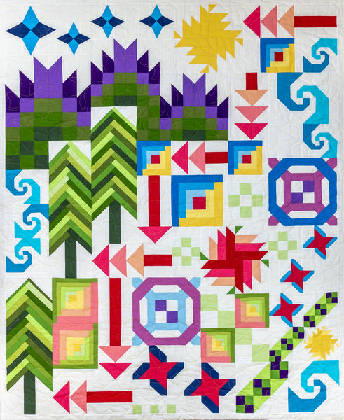 A unique bock of the month quilt depicting a road trip across the United States. Shown in Moda Bella Solid fabrics. A fat quarter friendly quilt.