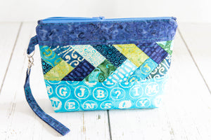 The medium Pack it Up! bag in Just My Type is a fun zippered pouch perfect for storing all those essentials.