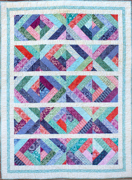 Crosscut - a blue quilt with braids made using batiks 