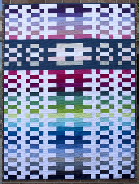 Lighthouse Steps - a strip quilt shown in solid fabrics