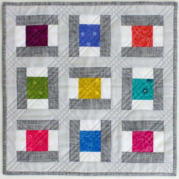 Saybrook Signals Mini quilt in white, grey and bright fabric squares