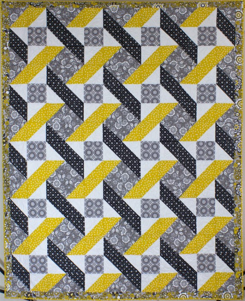 Urban Twist lap quilt in yellow and grey fabrics from Riley Blake's Parisian fabric line